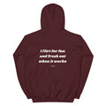 Maroon unisex heavy blend hoodie from LessSaid with "I FLIRT FOR FUN" print on the back, casual and cozy style.