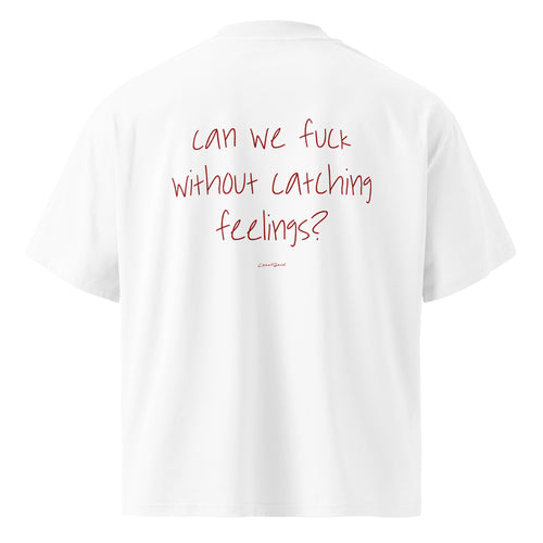 Unisex white oversized high-neck T-shirt by LessSaid with bold printed text on the back, made from organic cotton.