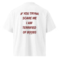 White unisex oversized organic high-neck T-shirt featuring the "I'M TERRIFIED OF BOOBS" LessSaid logo on the back.
