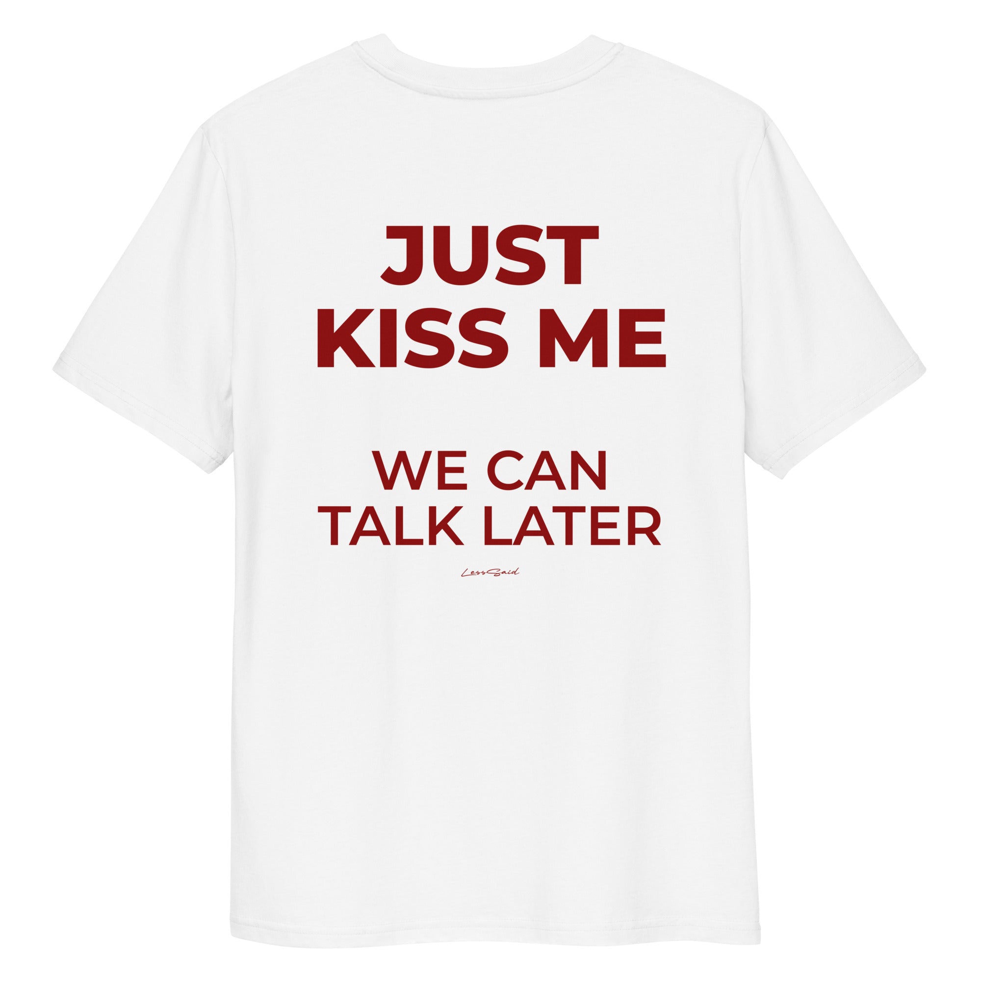 Unisex white organic cotton T-shirt from LessSaid with "Just Kiss Me" graphic on the back, casual and comfortable style.