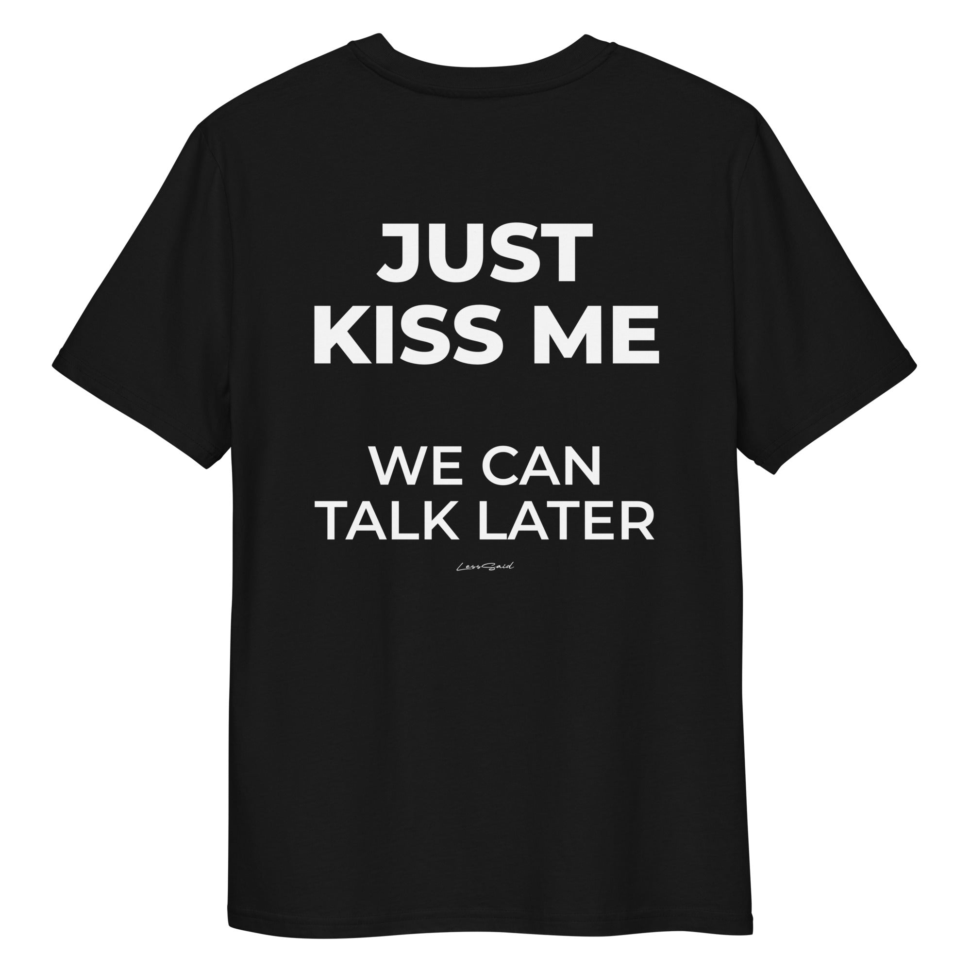 Unisex black organic cotton T-shirt with "JUST KISS ME" print on the back by LessSaid, casual and eco-friendly fashion.