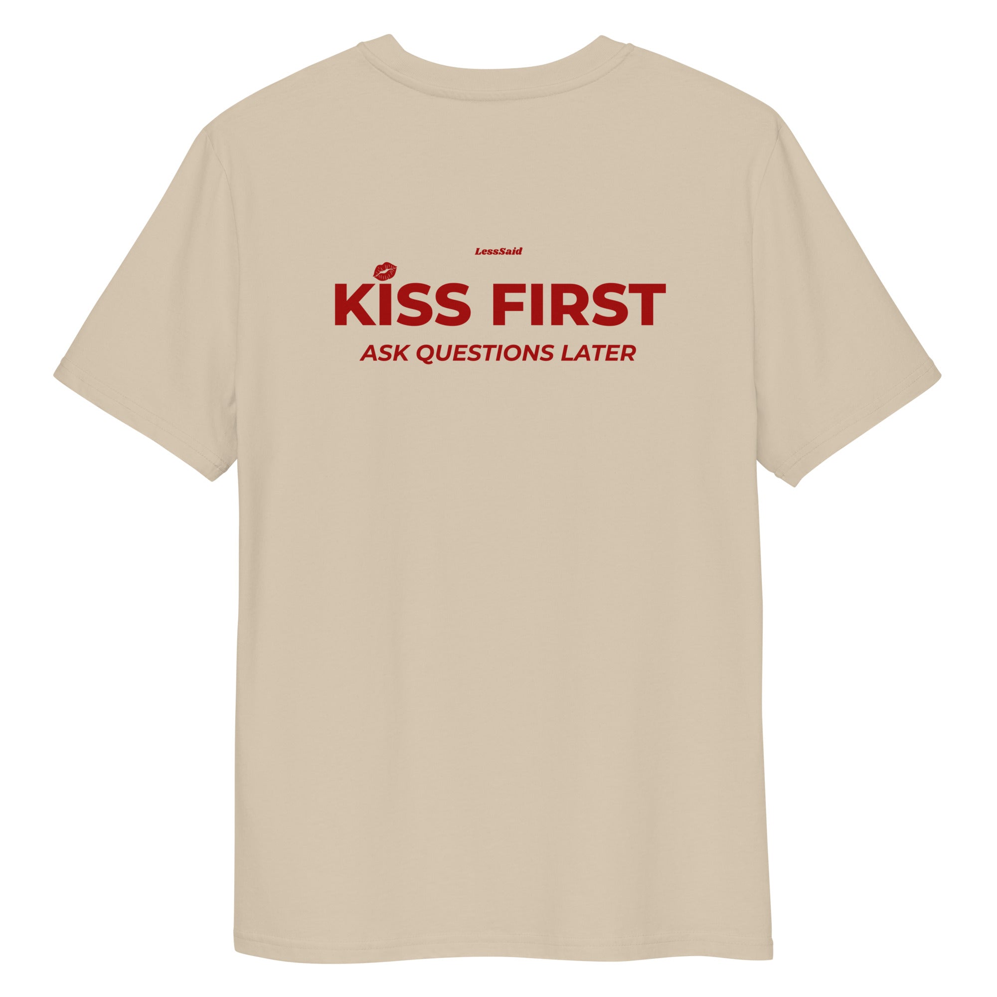 Unisex organic cotton T-shirt in desert dust color with "KISS FIRST ASK QUESTIONS LATER" graphic, from LessSaid.