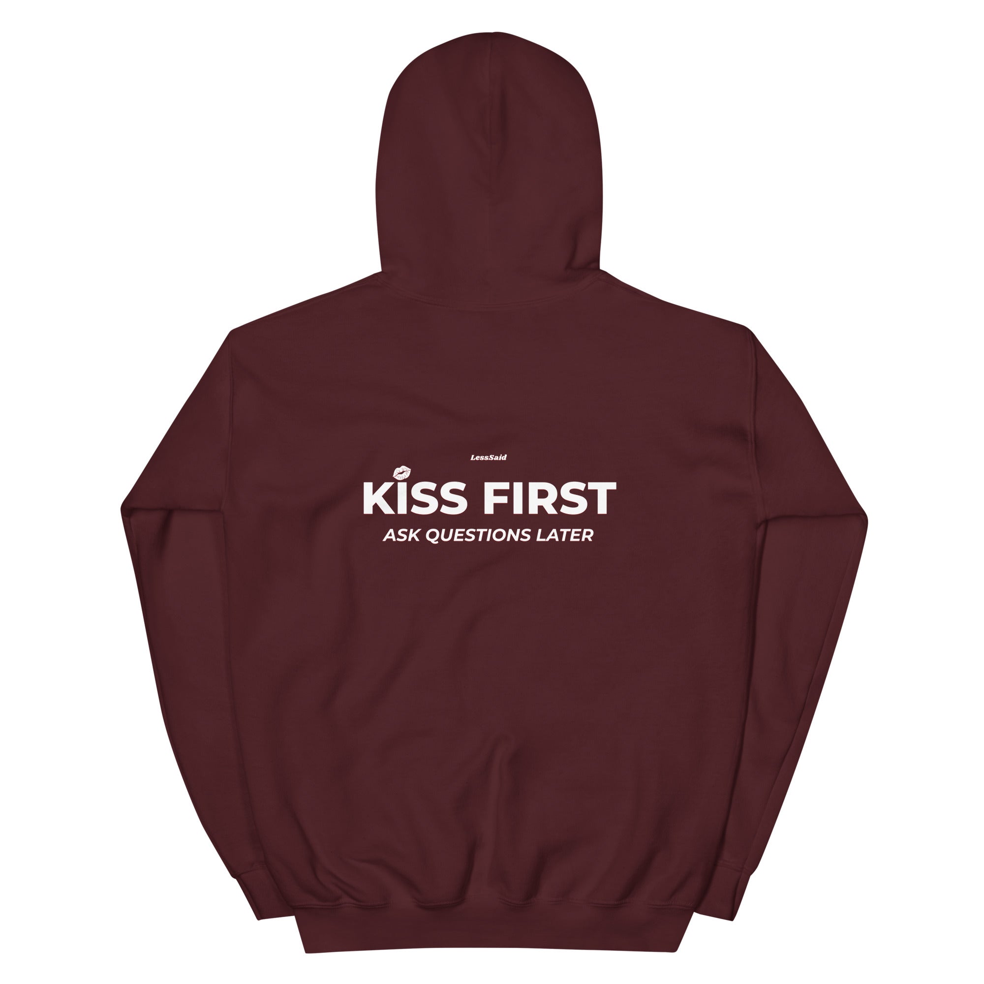 Maroon unisex heavy blend hoodie from LessSaid with "KISS FIRST ASK QUESTIONS LATER" text on the back.