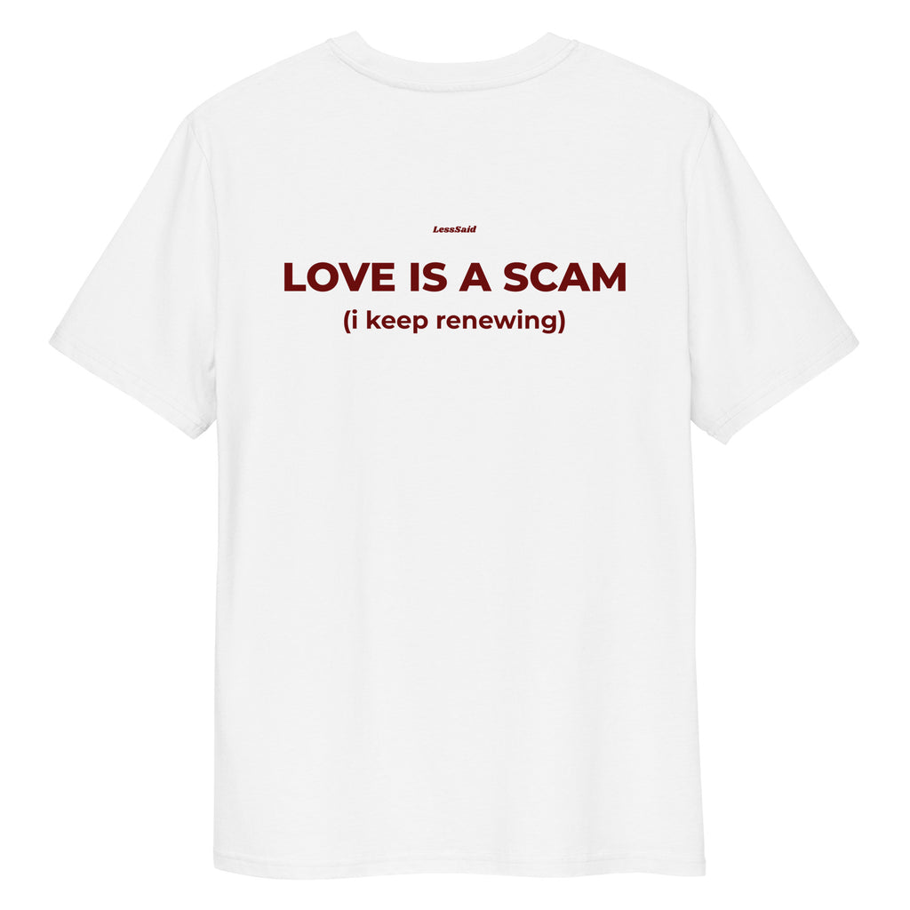 White unisex organic cotton T-shirt with "Love Is a Scam" print by LessSaid, shown from the back.
