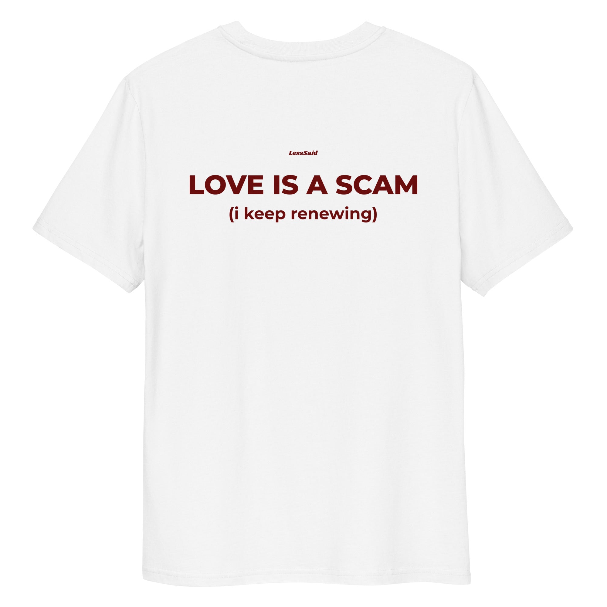 White unisex organic cotton T-shirt with "Love Is a Scam" print by LessSaid, shown from the back.