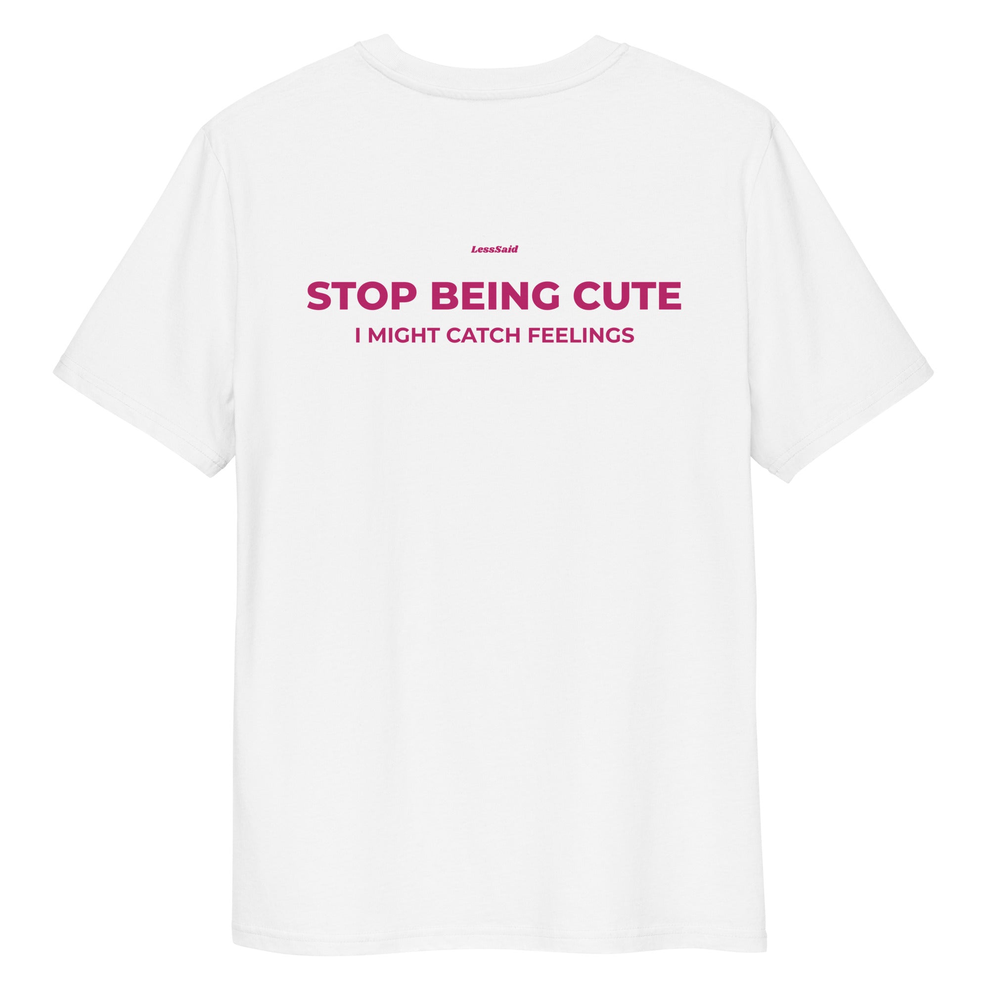 Unisex white organic cotton T-shirt with "Stop Being Cute" print from LessSaid, showing the back view.