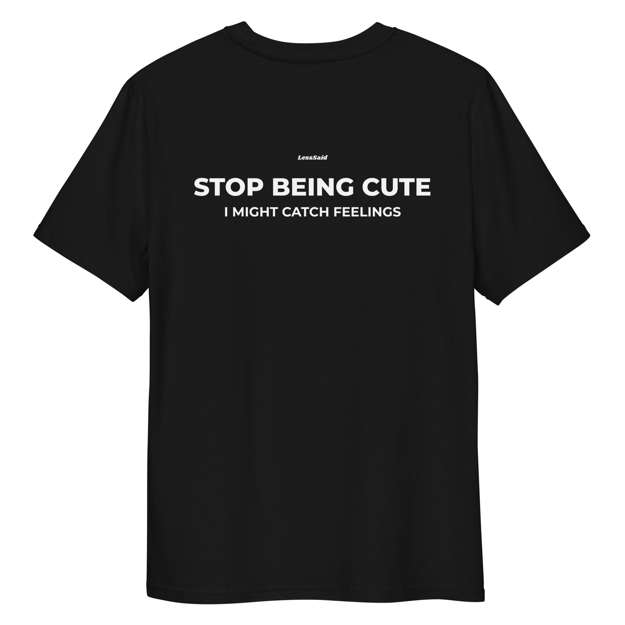 Unisex black organic cotton T-shirt with "STOP BEING CUTE" graphic on the back, by LessSaid.