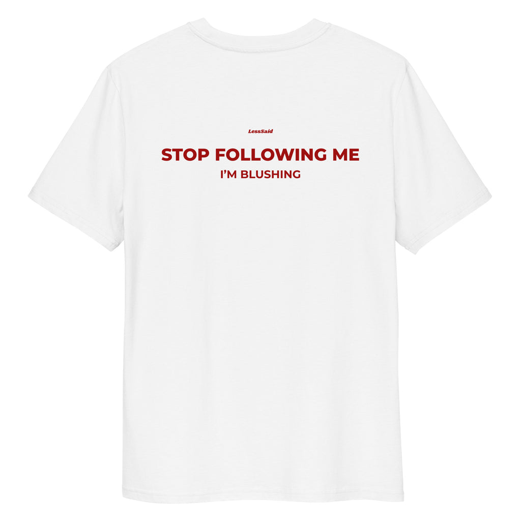 White unisex organic cotton T-shirt with "STOP FOLLOWING ME" printed on the back by LessSaid.