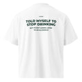 White unisex oversized T-shirt from LessSaid with high neckline and printed message "Told myself to stop drinking" on the back.
